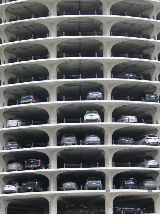 The curved decks of a multi-storey parking structure